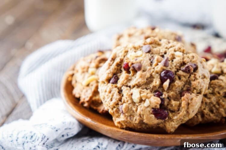 An appetizing arrangement of Everything Breakfast Cookies, presented on a rustic wooden board, ready to nourish and delight.