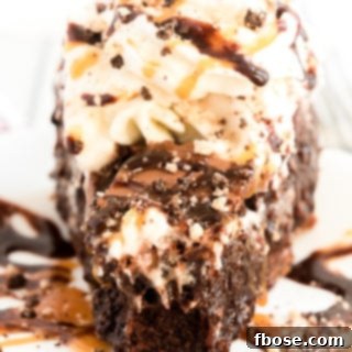 Fudgy Brownie Pie 10 This Brownie Pie is the ultimate comfort dessert! A brownie baked into a graham cracker crust and laced with caramel, then topped with whipped cream and both caramel and chocolate drizzle!