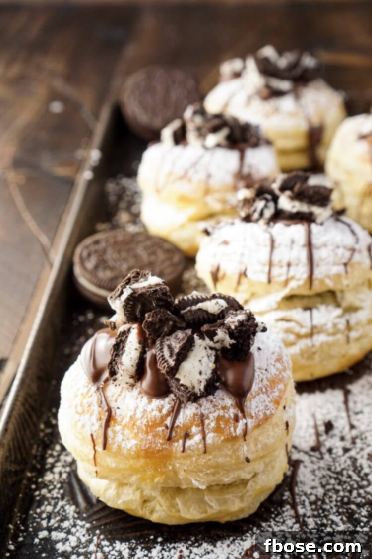 Freshly baked Croissookies cooling on a wire rack, steam gently rising.