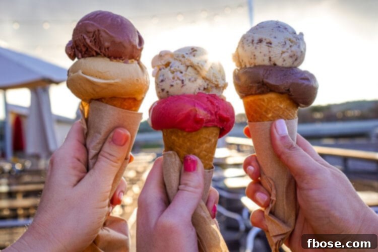 Variety of ice cream flavors in cups at Three Twins Ice Cream