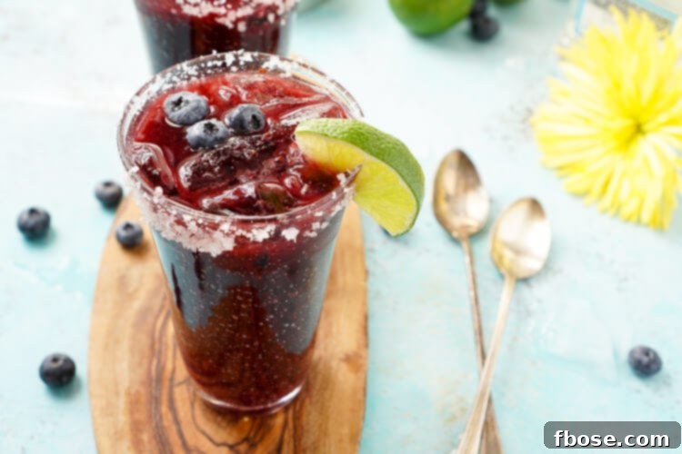 This Fresh Blueberry Margarita captures the essence of summer with ripe blueberries and Altos Tequila, a perfect New England rendition of the classic margarita.