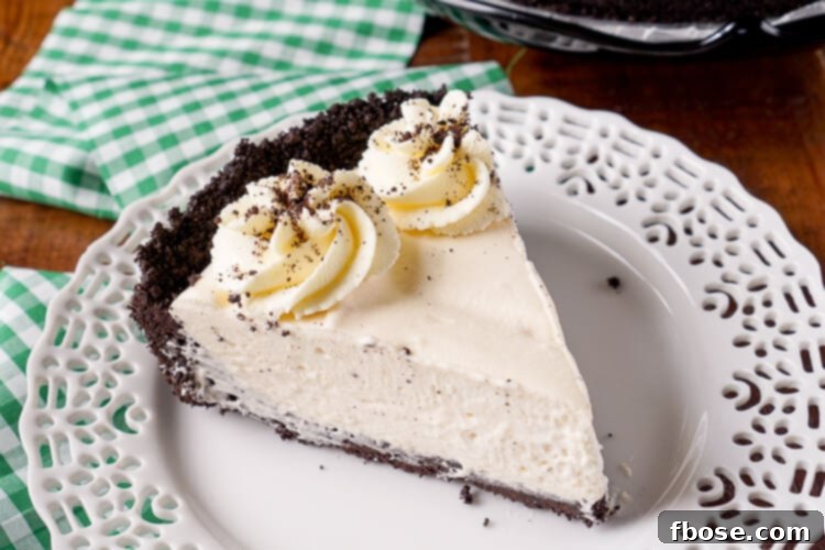 This Irish Cream Pie is an easy dessert laced with Baileys and perfect for St. Patrick's Day! A chocolate cookie crust filled with a cream marshmallow and Irish Cream filling and topped with vanilla whipped cream!