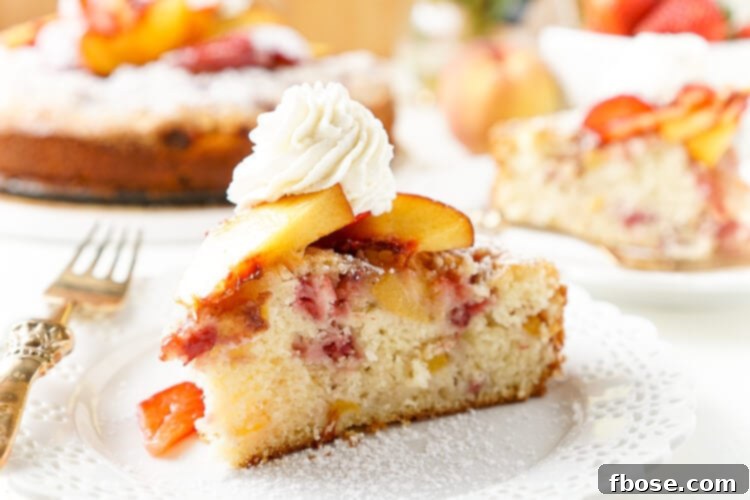 Strawberry Peach Coffee Cake 6 A close-up of the streusel topping on the Strawberry and Peach Coffee Cake, showing its golden color and texture.