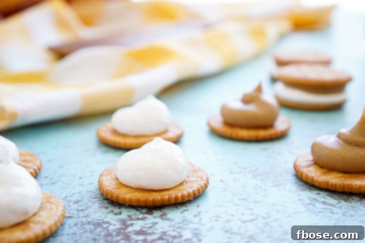 Arrangement of Fluffernutter RITZwiches on a plate, highlighting the delicious contrast of textures and flavors. A fast and easy snack idea for parties or everyday cravings.