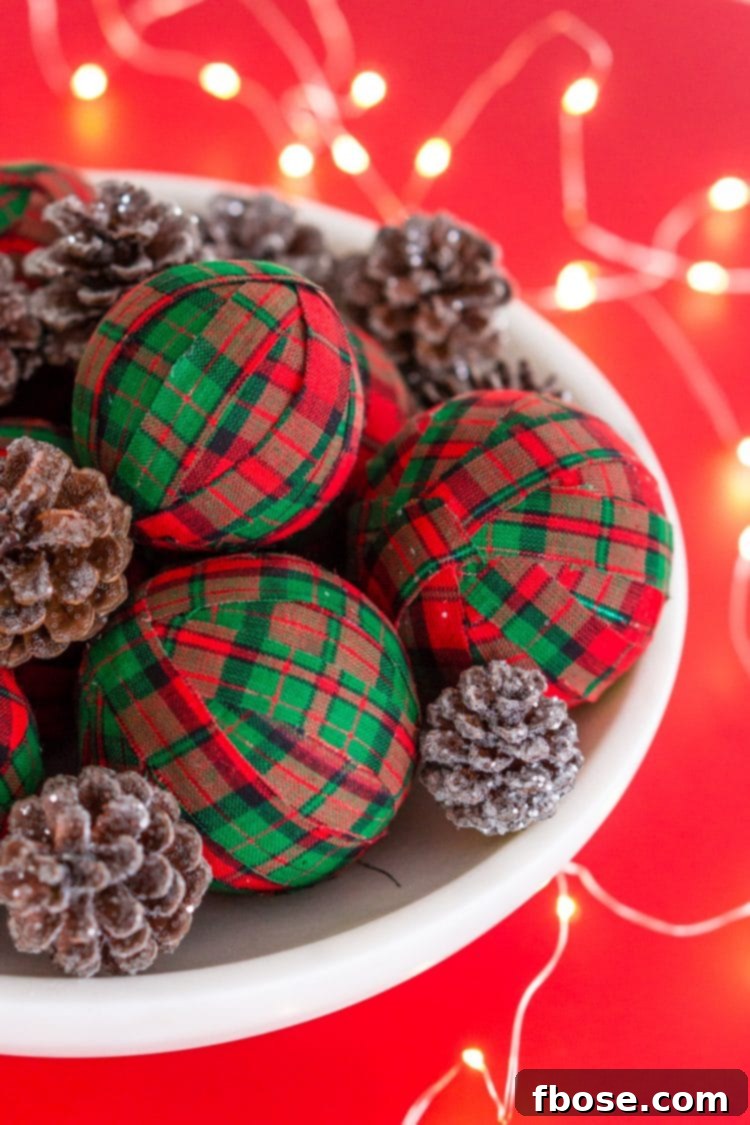 DIY Holiday Rag Balls display beautifully arranged in a festive setting, showcasing their holiday charm and ease of creation.