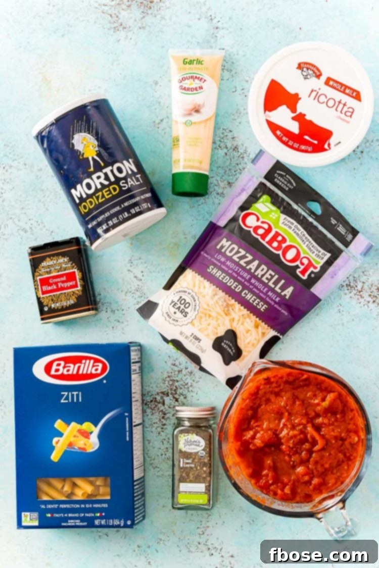 Deliciously Easy Baked Ziti 3 A vibrant flat lay image showcasing all the fresh ingredients needed to make delicious baked ziti.