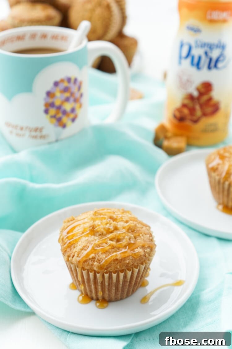 A tray of freshly baked caramel muffins cooling on a wire rack