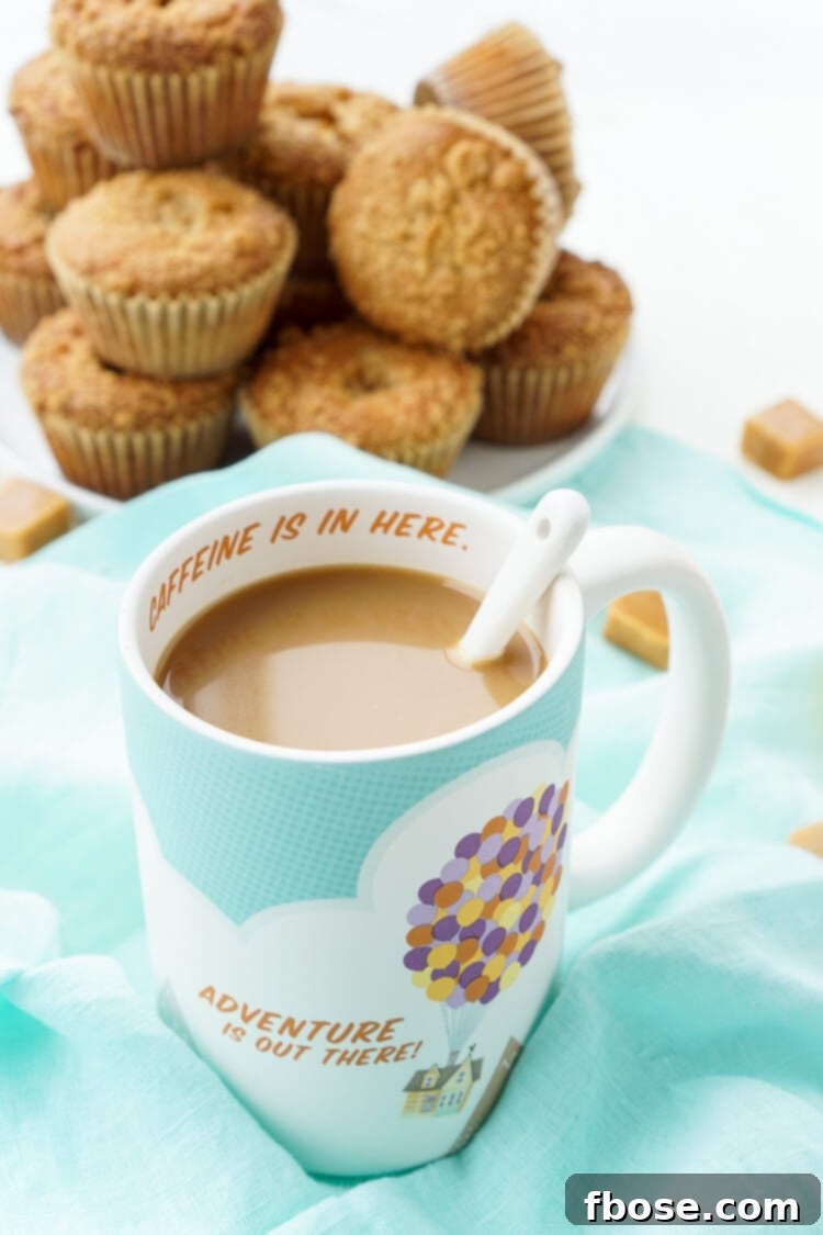 Several caramel muffins artfully arranged on a wooden board