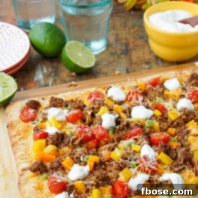 A vibrant and delicious Taco Pizza, perfect for an easy weeknight family dinner.