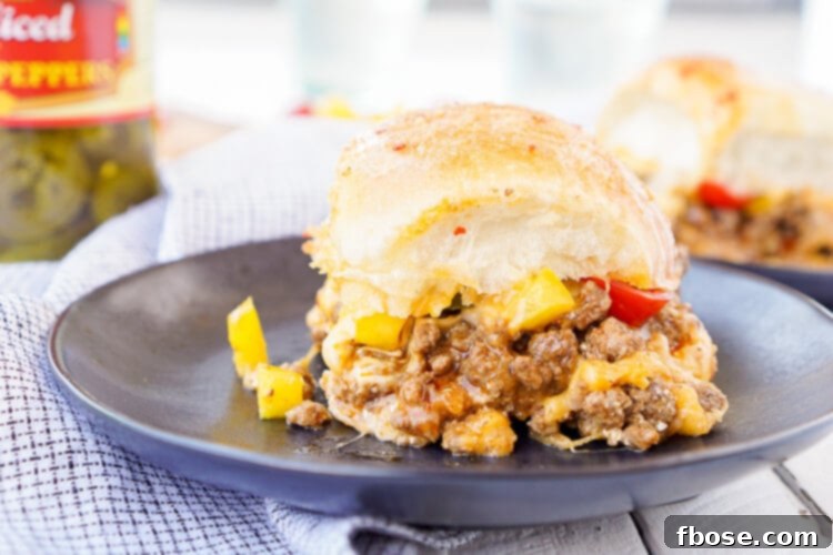 Finished Easy Taco Sliders, fresh from the oven, showcasing melted cheese and perfectly toasted buns.