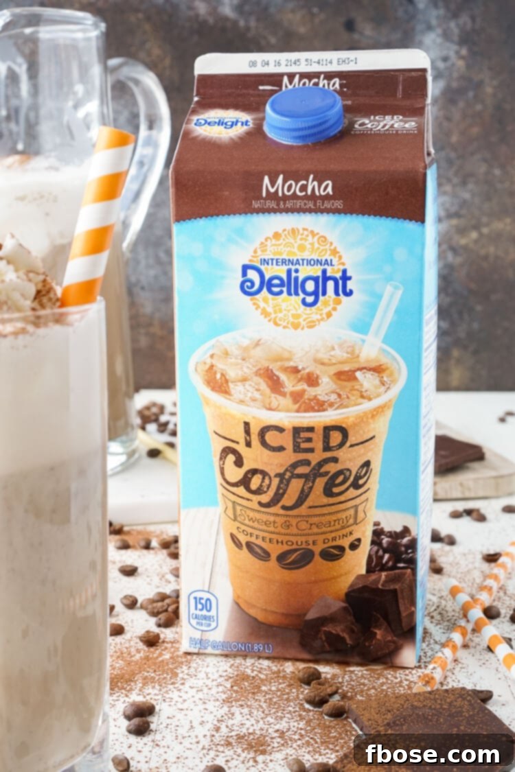 Mocha Coffee Punch being poured into a serving glass, highlighting its rich color