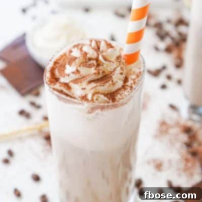 This Mocha Coffee Punch is bound to be a new party favorite by hosts and guests alike! It's easy to make and tastes amazingly creamy and delicious! Made with mocha iced coffee, sugar, milk, and vanilla ice cream, you'll love the fresh new take on the traditional party punch!