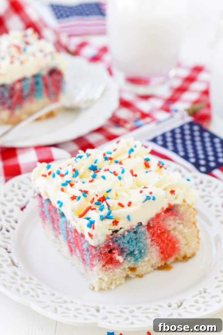 Americana Swirl Sheet Cake 2 This Red, White, and Blue Marble Sheet Cake is made with an adapted cake box mix and topped with a whipped white chocolate frosting. It's the perfect patriotic dessert for the 4th of July!