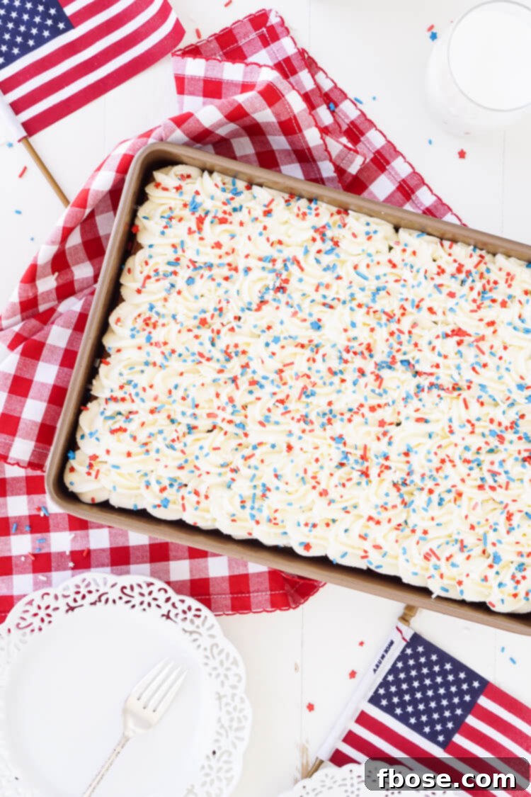 Americana Swirl Sheet Cake 3 This Red, White, and Blue Marble Sheet Cake is made with an adapted cake box mix and topped with a whipped white chocolate frosting. It's the perfect patriotic dessert for the 4th of July!
