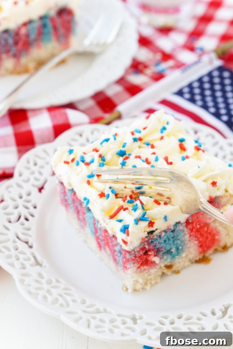 Americana Swirl Sheet Cake 5 This Red, White, and Blue Marble Sheet Cake is made with an adapted cake box mix and topped with a whipped white chocolate frosting. It's the perfect patriotic dessert for the 4th of July!