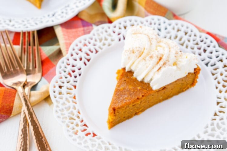 A freshly baked Impossible Pumpkin Pie cooling on a rack, before adding the whipped cream topping.