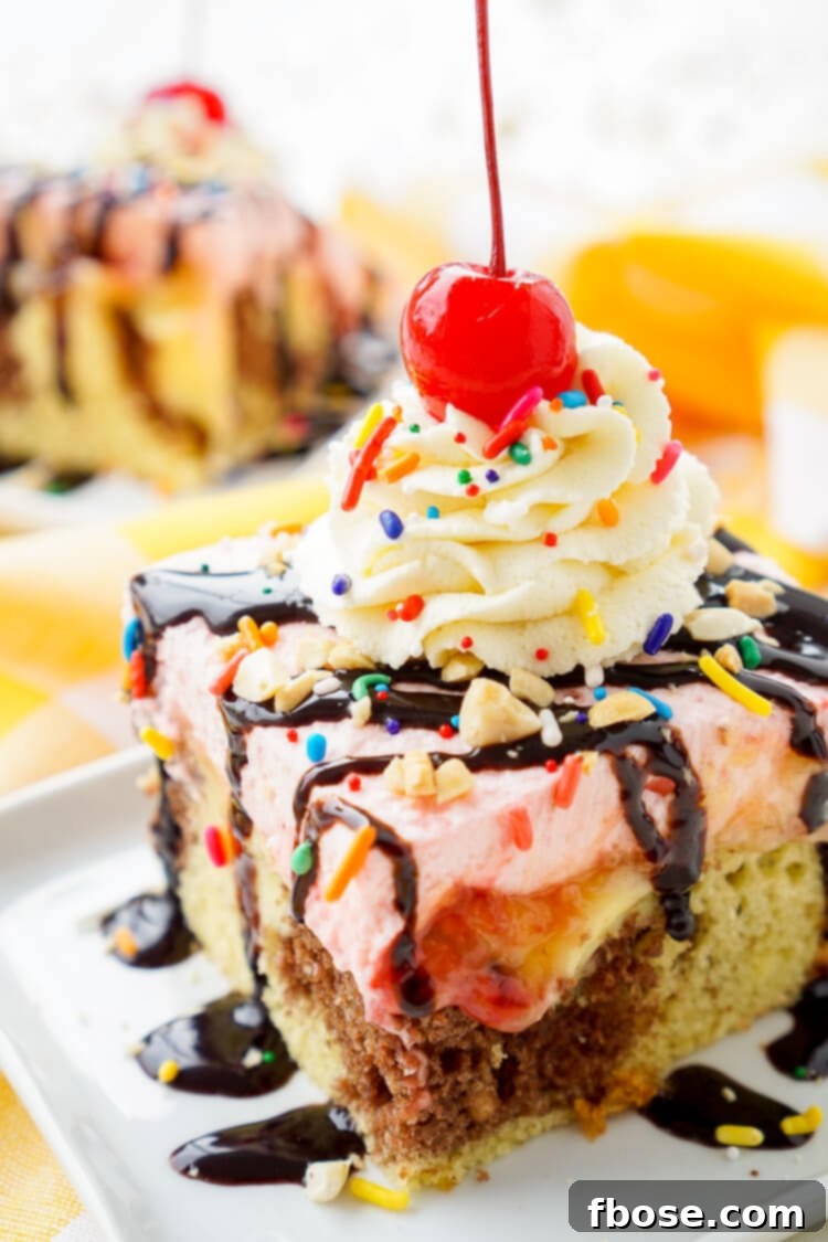 Irresistible Banana Split Cake 6 The finished Banana Split Cake, adorned with whipped cream swirls, chocolate syrup, sprinkles, nuts, and maraschino cherries.