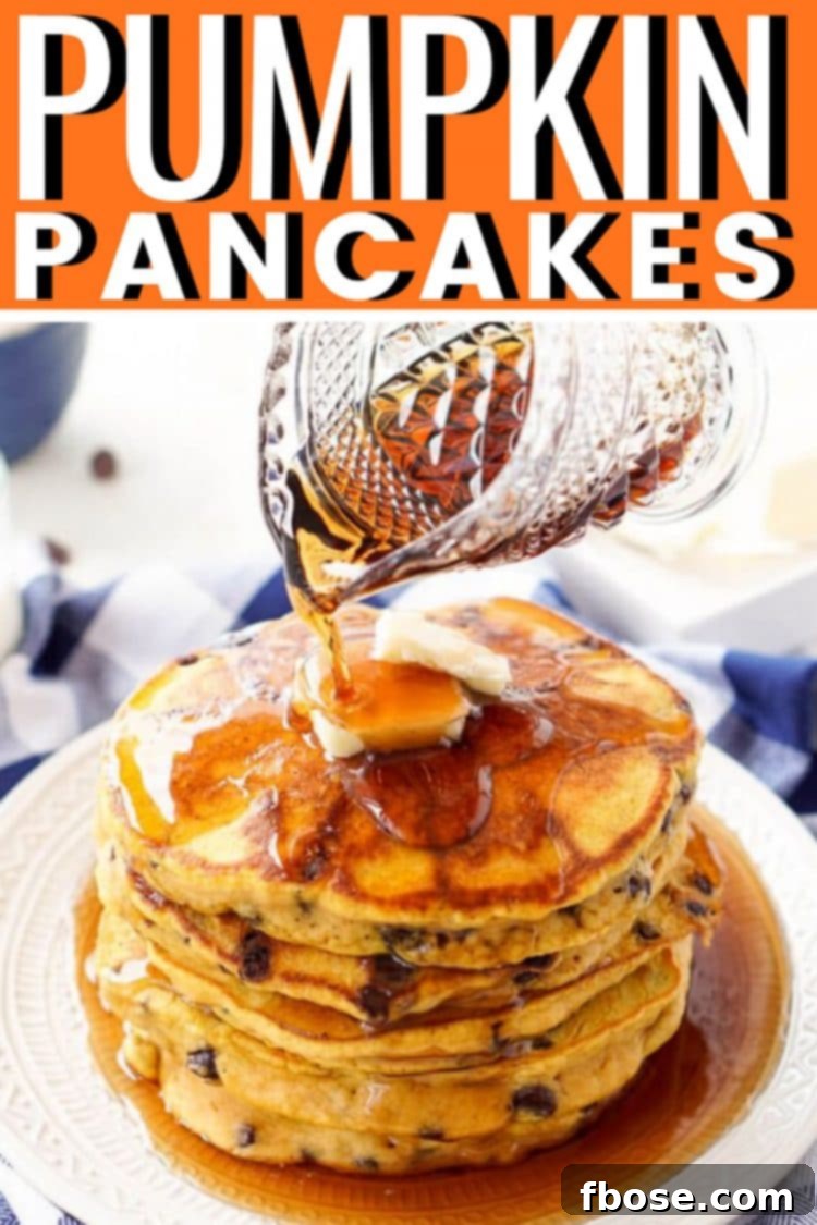 A vibrant overhead shot of Pumpkin Chocolate Chip Pancakes, beautifully styled for a magazine-quality presentation, inviting viewers to indulge.