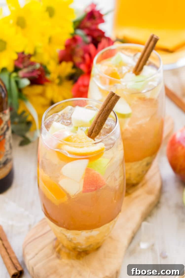 This Hard Apple Cider Sangria brings together the cozy flavors of apple, ginger, cinnamon, and citrus in a crisp and refreshing batch cocktail!