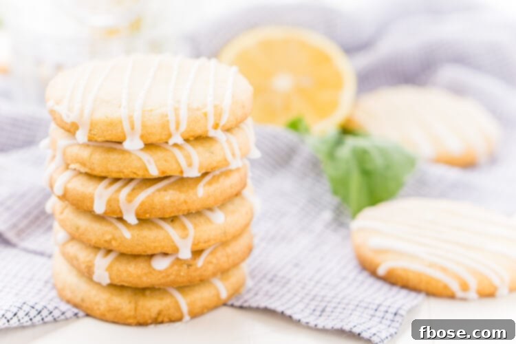 These Lemon Basil Shortbread Cookies will melt in your mouth, they're rich, sweet, and flaky. Made with butter, confectioners' sugar, flour, lemon zest, basil, and salt, they're perfect for tea, parties, or snacking!