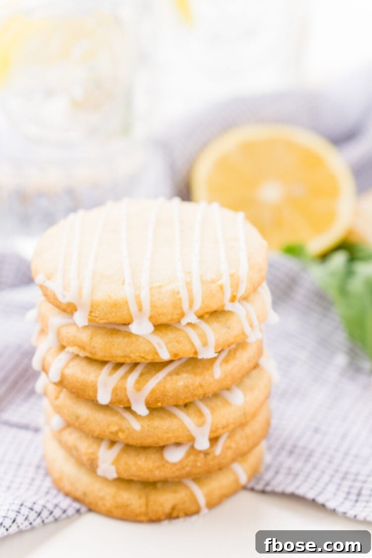 These Lemon Basil Shortbread Cookies will melt in your mouth, they're rich, sweet, and flaky. Made with butter, confectioners' sugar, flour, lemon zest, basil, and salt, they're perfect for tea, parties, or snacking!