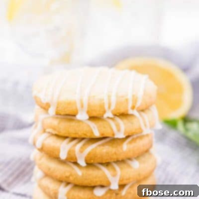 These Lemon Basil Shortbread Cookies will melt in your mouth, they're rich, sweet, and flaky. Made with butter, confectioners' sugar, flour, lemon zest, basil, and salt, they're perfect for tea, parties, or snacking!