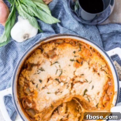This Easy One Pot Lasagna is a cozy and comforting dish you can make in your dutch oven in under an hour. A delicious meat sauce, oven-ready pasta, and three different kinds of cheese with a hint of basil and red pepper flakes make this a dish you'll want to make again and again!
