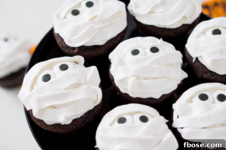 Spooky, sweet Mummy Halloween Cupcakes are the perfect addition to any Halloween celebration, whether it be a killer costume party or a scary movie marathon at home.