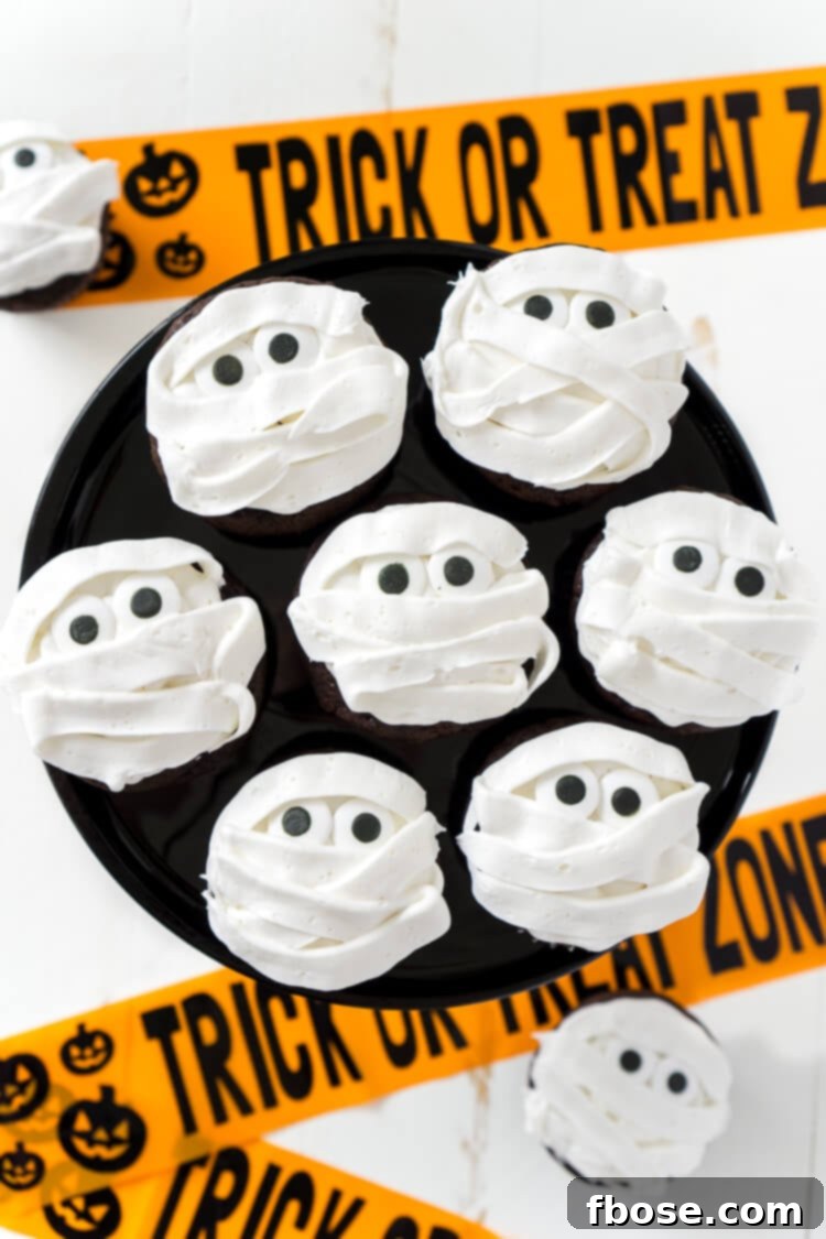 Spooky, sweet Mummy Halloween Cupcakes are the perfect addition to any Halloween celebration, whether it be a killer costume party or a scary movie marathon at home.