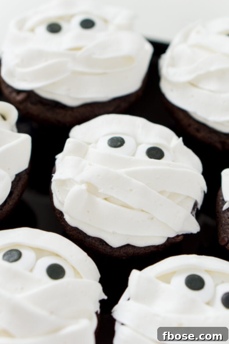 Spooky, sweet Mummy Halloween Cupcakes are the perfect addition to any Halloween celebration, whether it be a killer costume party or a scary movie marathon at home.