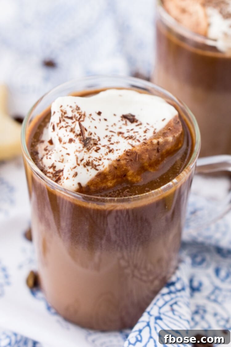 Indulge in Hot Chocolate Coffee, a rich blend of creamy hot chocolate and bold dark roast coffee, perfect for holidays or chilly days.