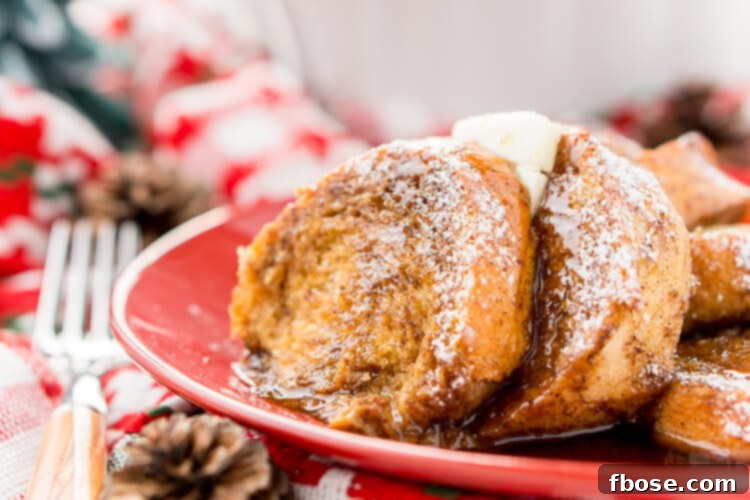 A wider shot of the Gingerbread French Toast Bake Casserole, showcasing its golden crust and inviting appearance, ready to be enjoyed.