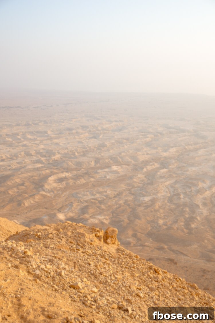 Hikers gathered at the summit of Masada, watching the sunrise over the Dead Sea