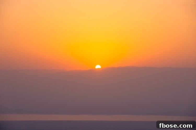 Majestic sunrise over the Moab Mountains as seen from the Masada fortress