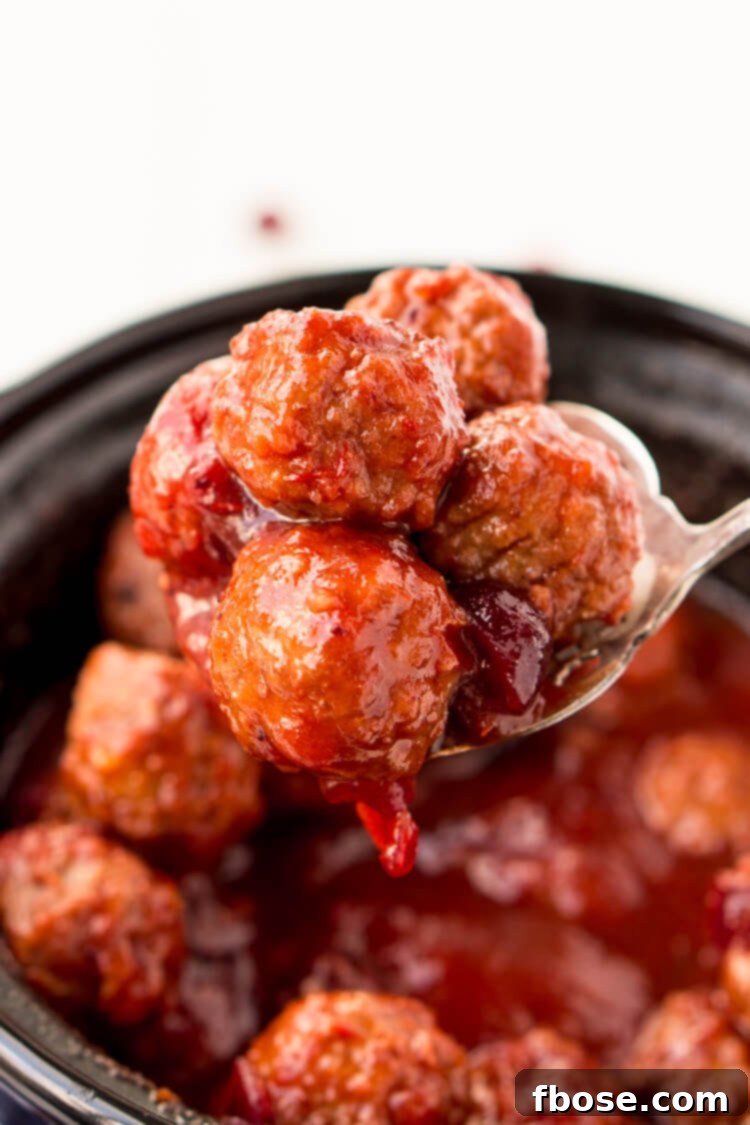 Sweet and tangy Cranberry Orange Meatballs made effortlessly in a slow cooker, perfect for holiday gatherings and game day appetizers. Just 4 ingredients and 5 minutes of prep!
