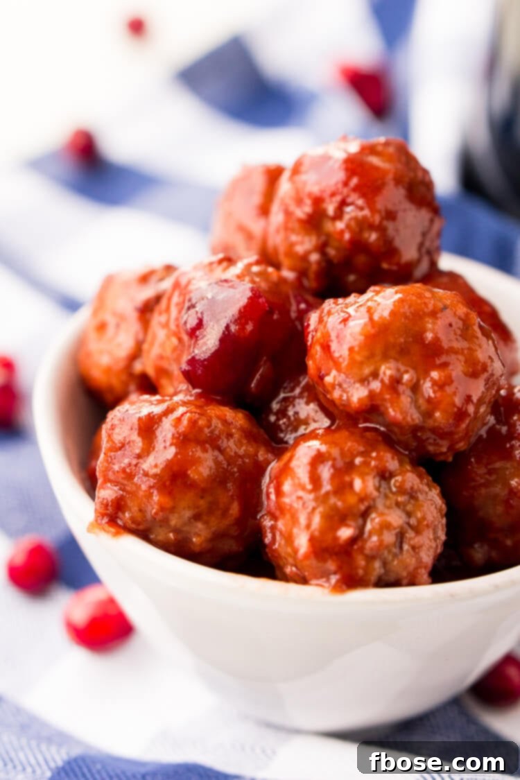 Ingredients for Cranberry Orange Meatballs laid out: frozen meatballs, chili sauce, cranberry sauce, and orange juice.