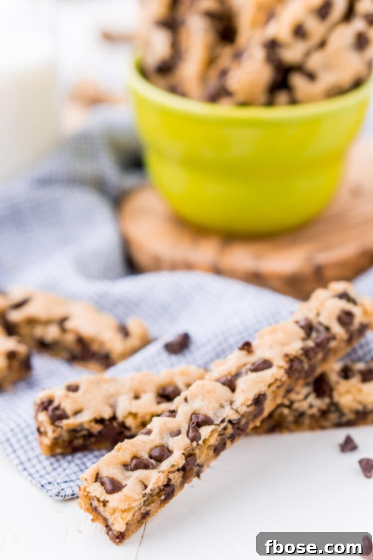 Chocolate Chip Cookie Sticks are a fun twist on classic chocolate chip cookies and the perfect dessert for dipping! A thick, slightly crisp, yet still chewy cookie loaded with chocolate chips and made in a 9 x 13-inch pan for easy baking!