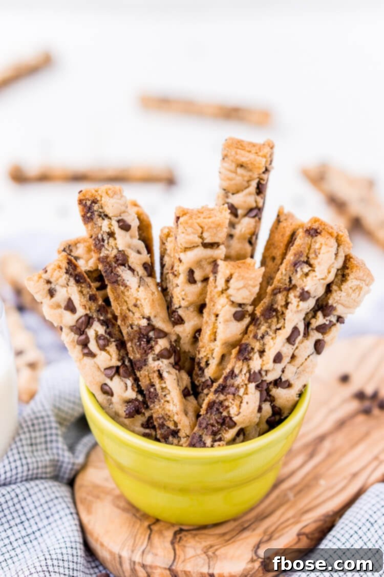 Chocolate Chip Cookie Sticks are a fun twist on classic chocolate chip cookies and the perfect dessert for dipping! A thick, slightly crisp, yet still chewy cookie loaded with chocolate chips and made in a 9 x 13-inch pan for easy baking!