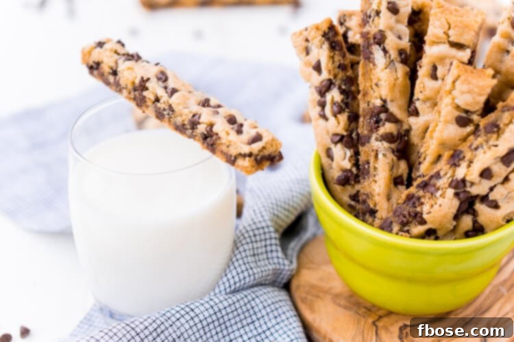 Chocolate Chip Cookie Sticks are a fun twist on classic chocolate chip cookies and the perfect dessert for dipping! A thick, slightly crisp, yet still chewy cookie loaded with chocolate chips and made in a 9 x 13-inch pan for easy baking!