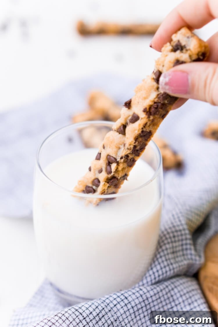 Chocolate Chip Cookie Sticks are a fun twist on classic chocolate chip cookies and the perfect dessert for dipping! A thick, slightly crisp, yet still chewy cookie loaded with chocolate chips and made in a 9 x 13-inch pan for easy baking!