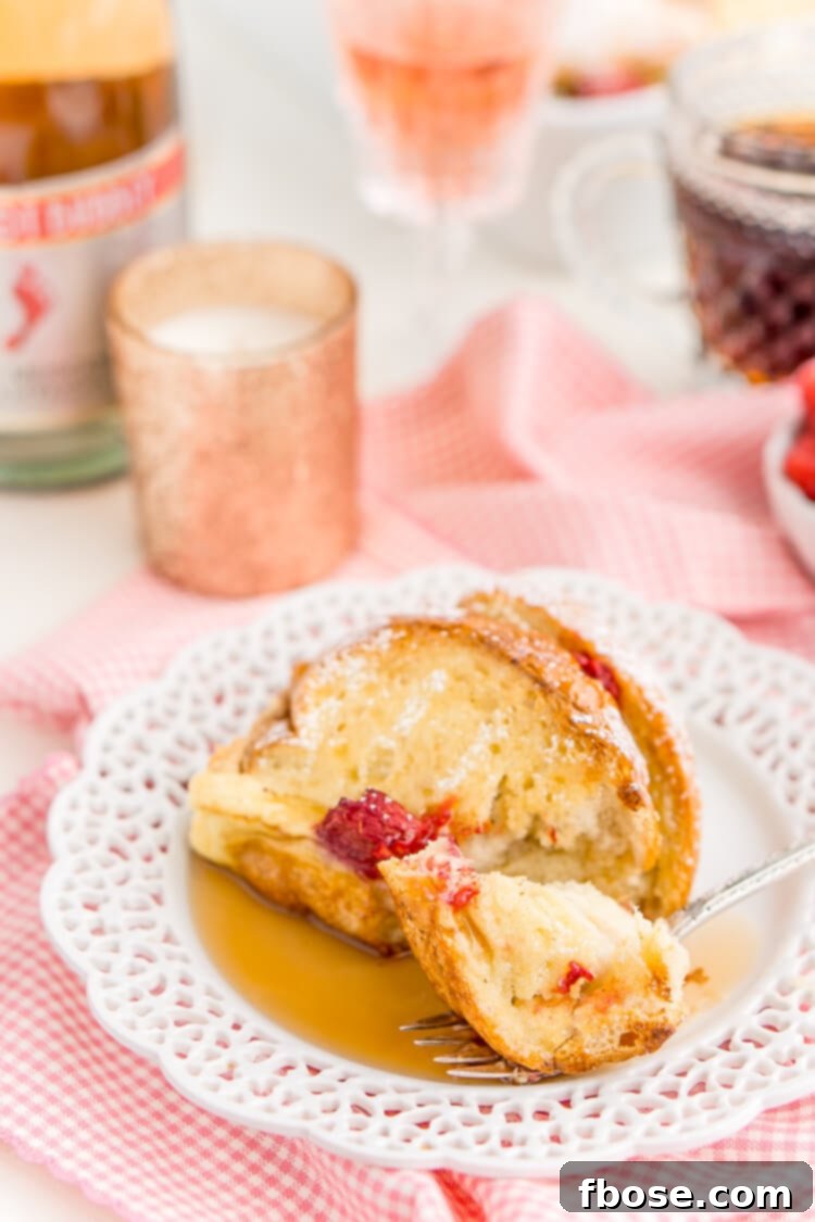 Champagne Raspberry Baked French Toast presented as a delightful morning indulgence, perfect for any special occasion, ready to be enjoyed.