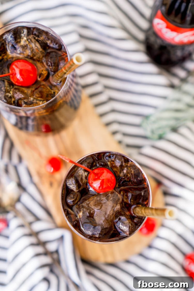 Roy Rogers Mocktail is an easy and popular non-alcoholic drink recipe made with Coke and grenadine and named for the famous singer and actor.