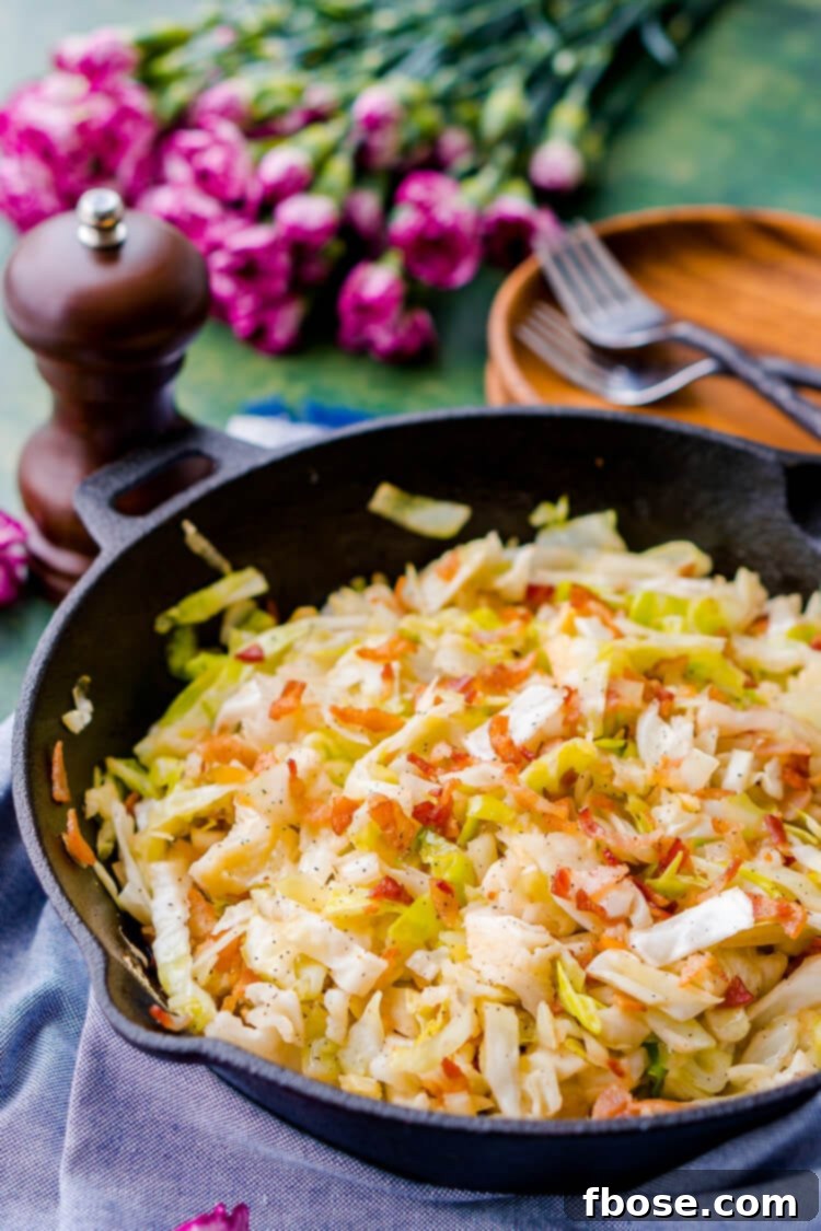 A cast iron skillet with fried cabbage.