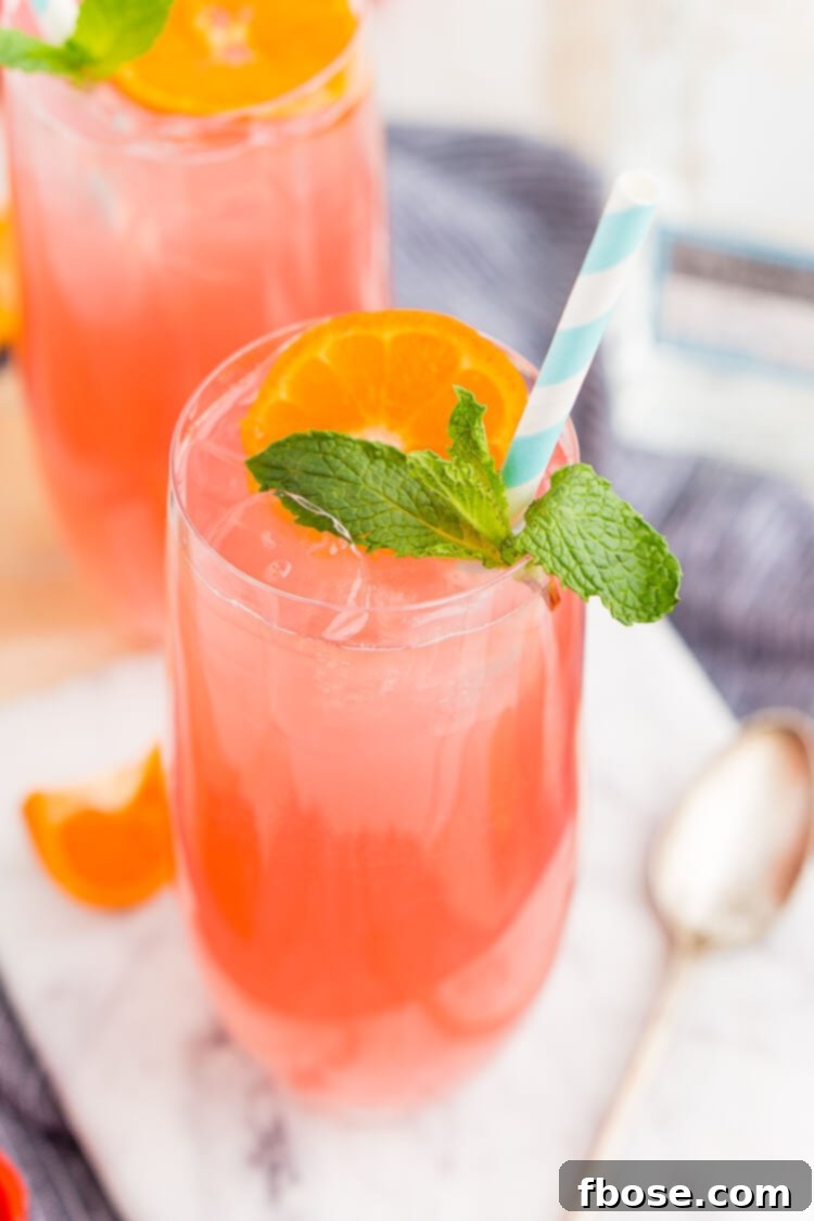 A refreshing Cactus Cooler Tequila Cocktail served in a tall glass with ice.