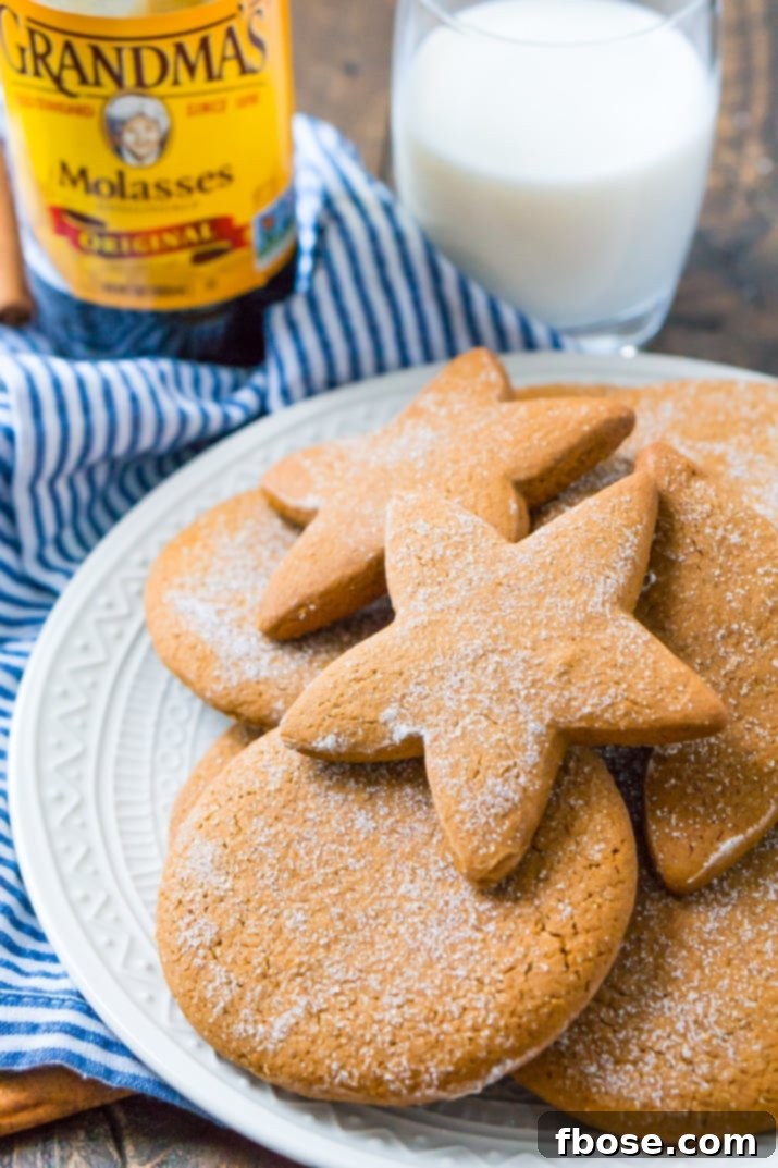 Classic Chewy Molasses Cookies 2 Deliciously soft molasses cookies, a dairy-free classic dessert perfect for holidays and family gatherings, showcasing their crackled tops and rich color.