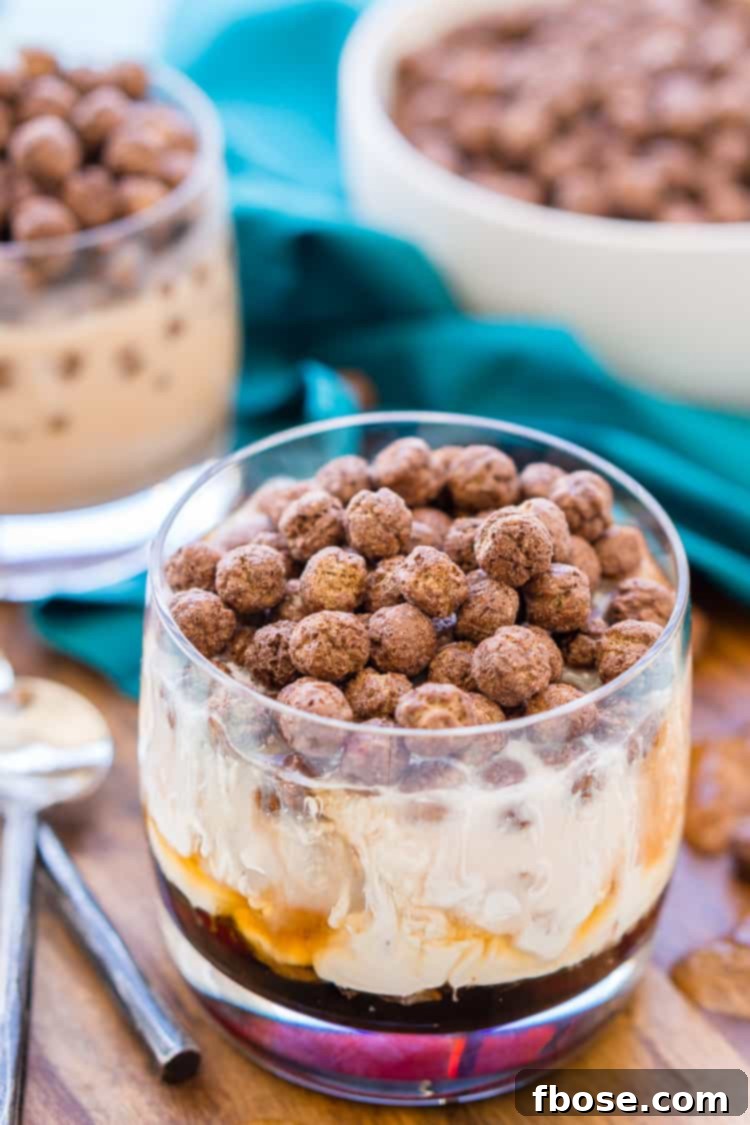 A refreshing Cocoa Puffs White Russian cocktail, garnished with chocolate cereal, perfect for late nights or brunch.