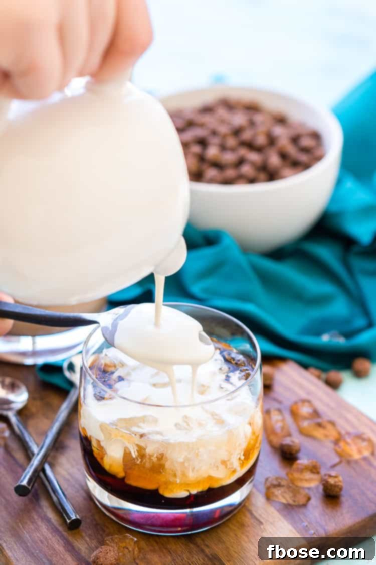 An intriguing Cocoa Puffs White Russian cocktail, a creative twist on the classic, served with cereal garnish.