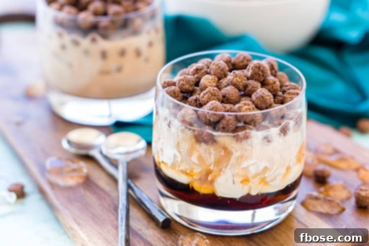 A Cocoa Puffs White Russian cocktail in a glass, ready to be enjoyed as a sweet and strong drink.