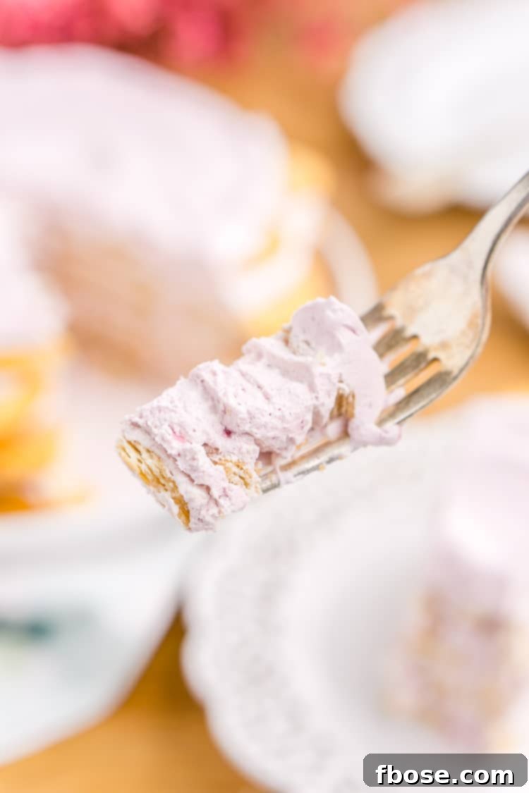 This Ritz Cracker & Grape Jelly Icebox Cake is an old fashioned, no bake, 3-ingredient dessert the whole family will love! It's super EASY to make and you can whip it up the day before!