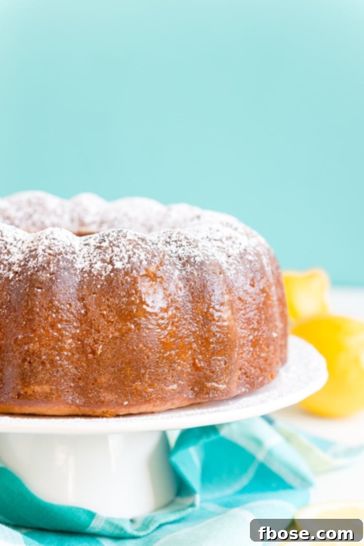 The final Lemon Butter Cake, beautifully glazed and ready to be enjoyed, promising a memorable dessert experience.